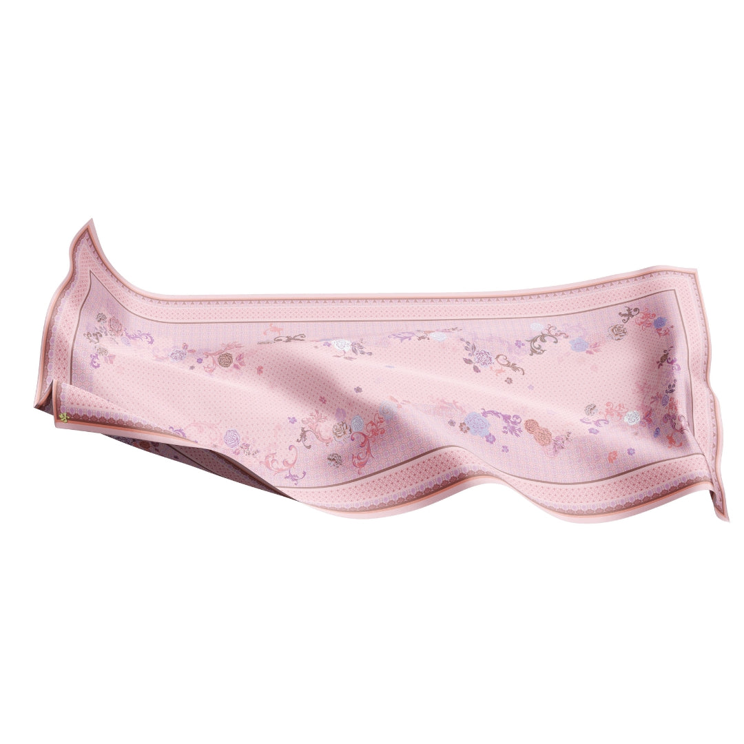 Pink chiffon shawl with intricate floral pattern on a white background