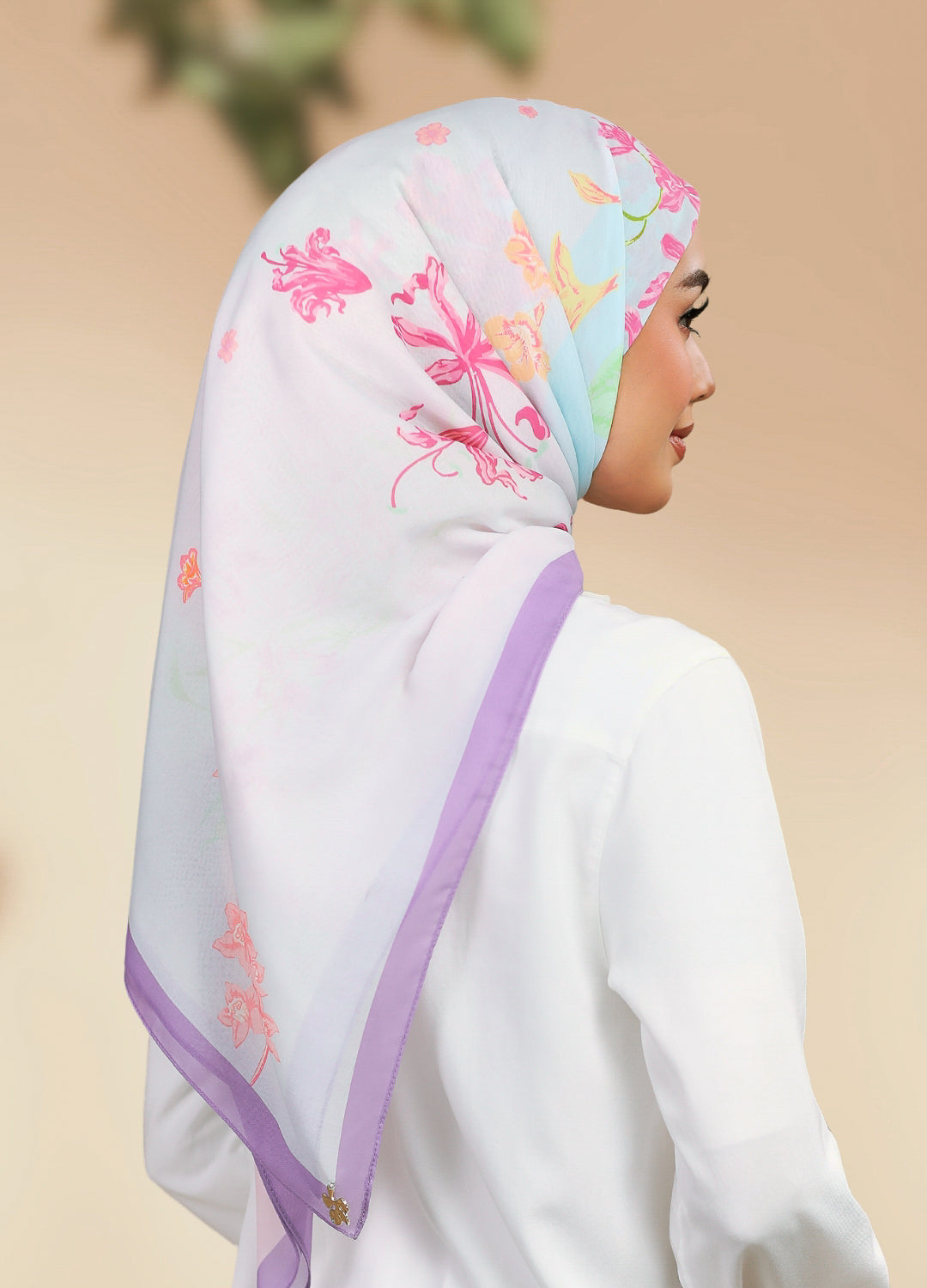 Model wearing printed vintage floral cotton voile tudung bawal - lilac