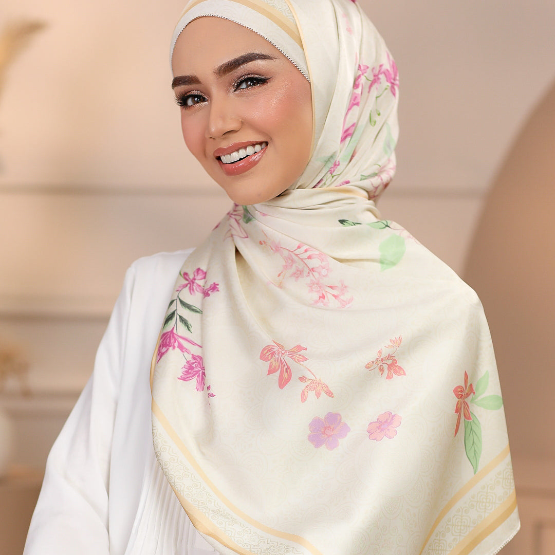 Model wearing printed feminine floral silk satin shawl in beige colour