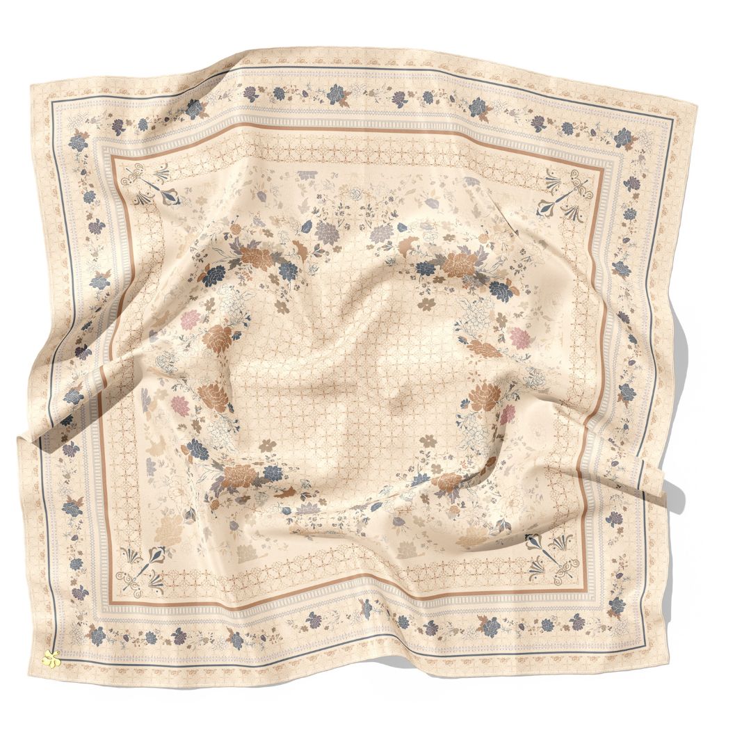 Beige scarf with floral pattern on a white background