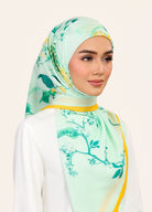 Model wearing printed intricate floral cotton voile bawal tudung - Light Green