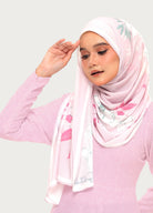 Model wearing printed chiffon shawl pink grey background