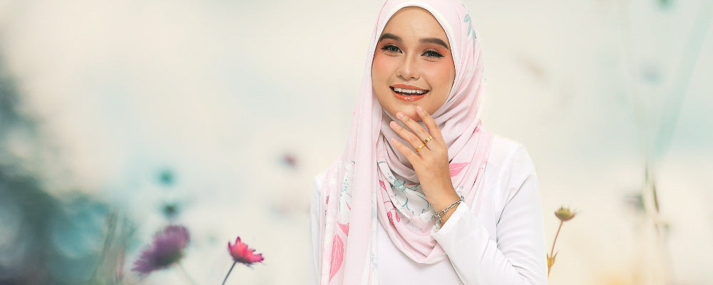 Model wearing printed chiffon shawl hijab pink