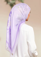 Model wearing printed peony floral cotton tudung bawal - purple