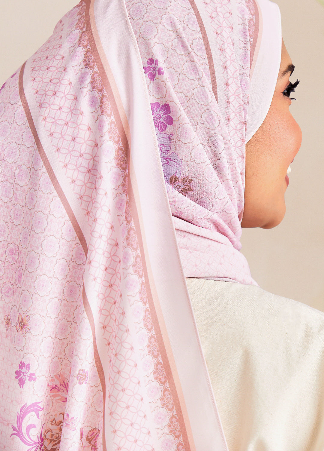 Women wearing soft purple floral chiffon shawl with nude background