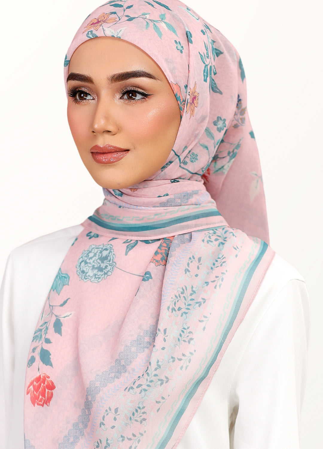 Model wearing printed stylized floral cotton bawal in dusty pink