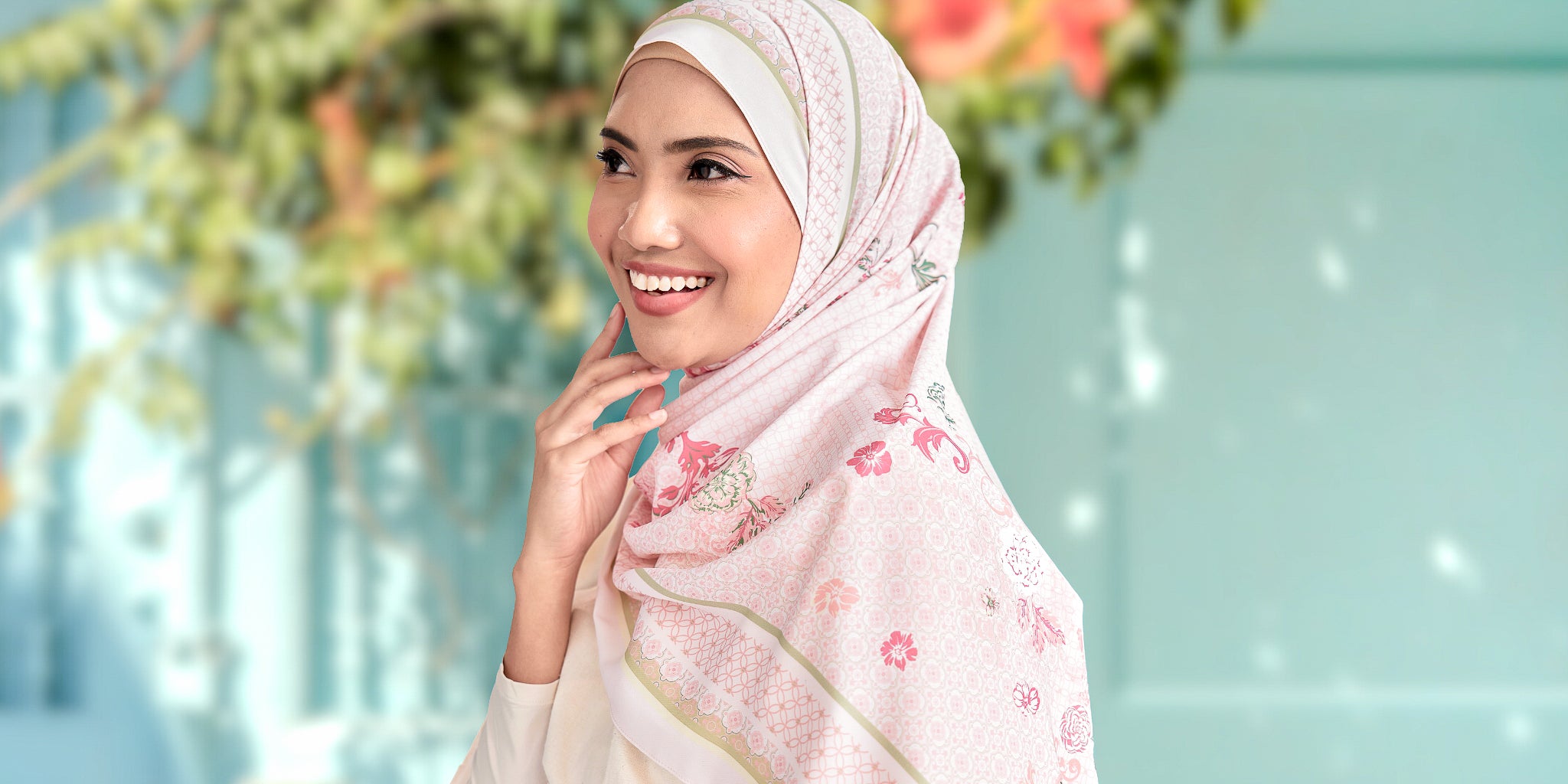 Woman wearing a floral headscarf with a blurred background