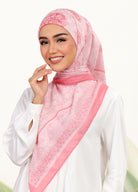 Model wearing filligree floral design cotton tudung bawal - salmon pink