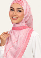 Model wearing Printed filligree floral cotton tudung scarf - salmon pink