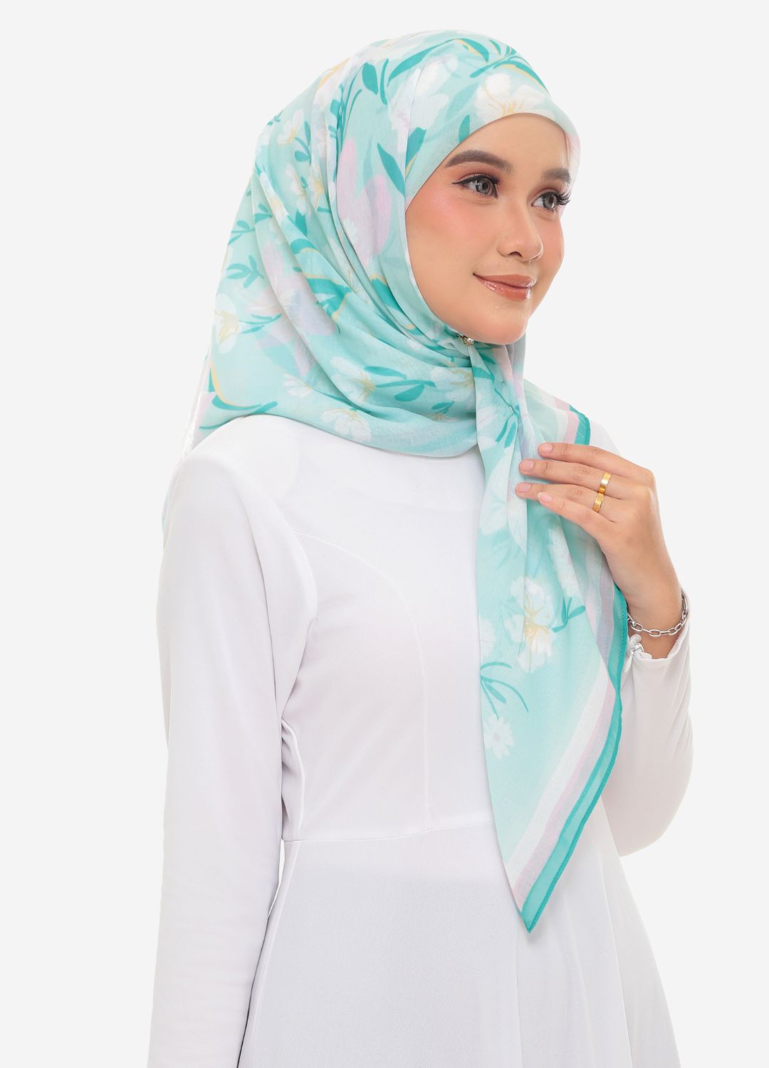 model wearing printed cotton tudung bawal cyan