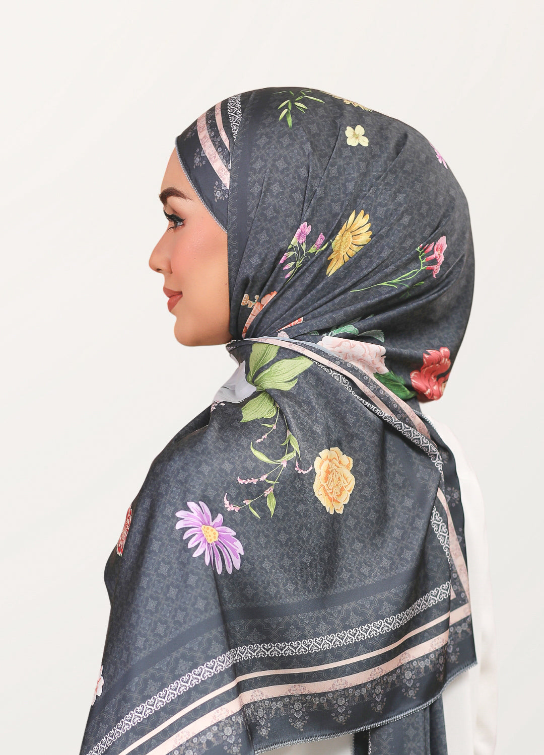 Model wearing printed botanical floral silk satin shawl - black