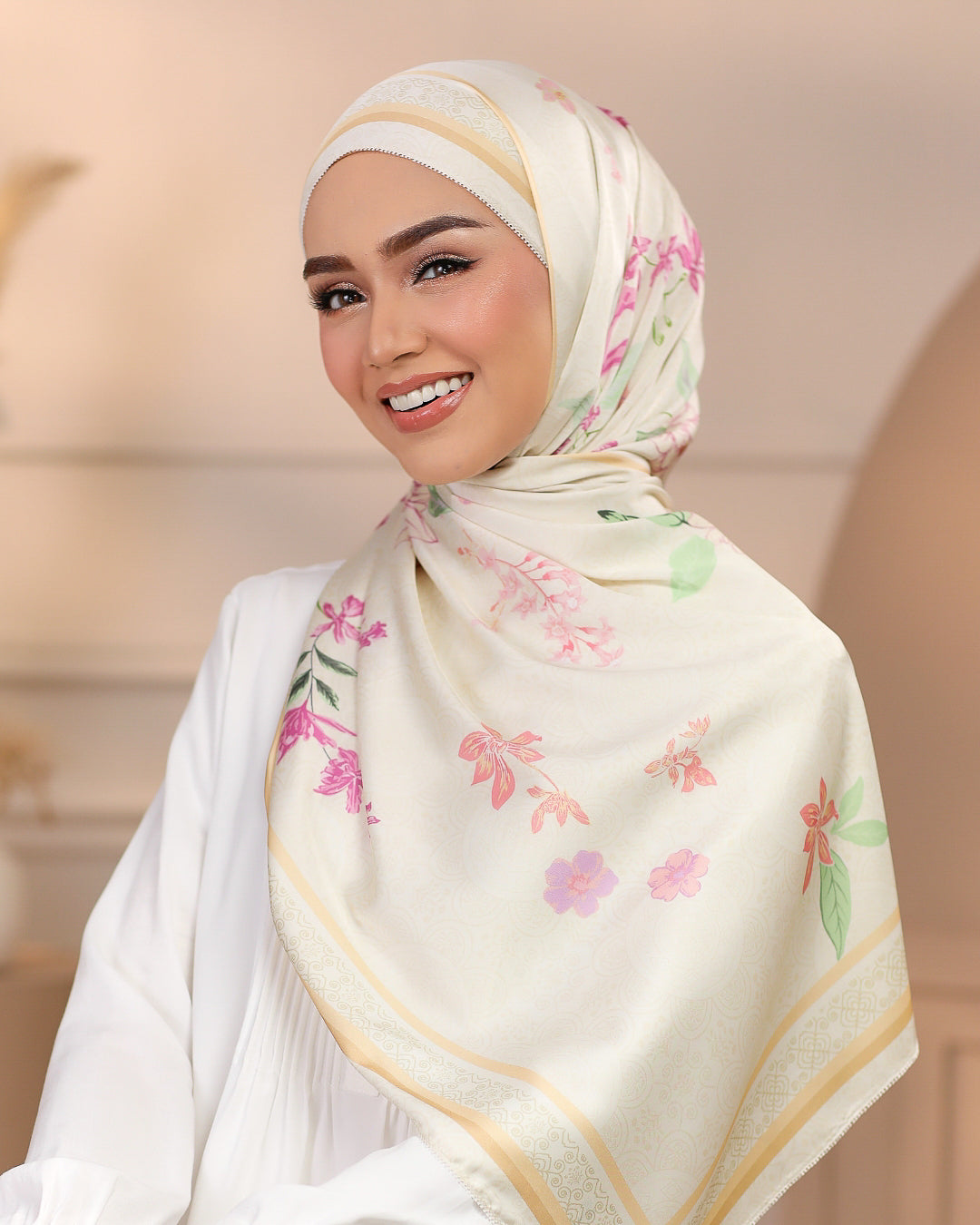 Model wearing printed feminine floral silk satin shawl in beige colour