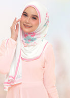 Model wearing printed floral chiffon shawl white smiling with light background