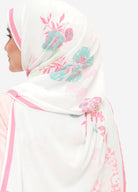 Model wearing lola printed floral chiffon shawl white back view plain background