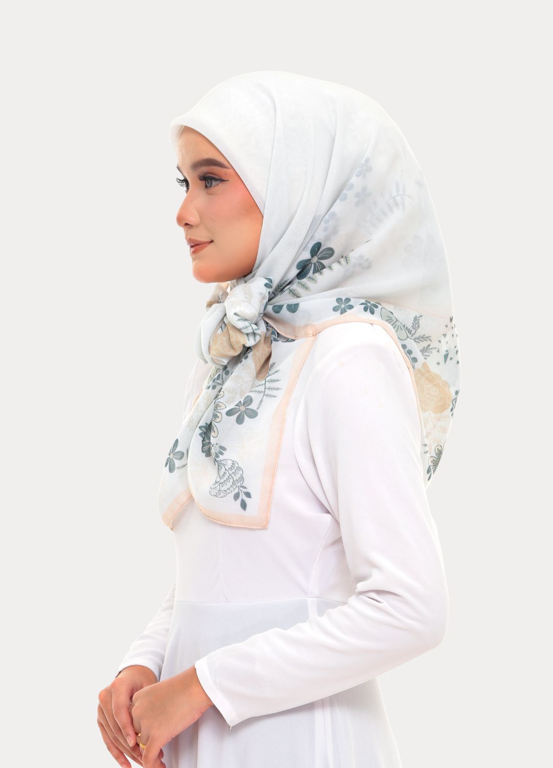 model wearing printed border floral cotton bawal 