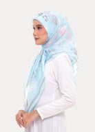 model wearing printed cotton tudung baby blue side view