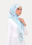 model wearing printed cotton tudung baby blue