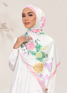 Model wearing printed botanical floral silk satin shawl tudung - white